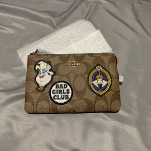 COACH X DISNEY | Corner Zip Wristlet Sig Canvas Villain Patches